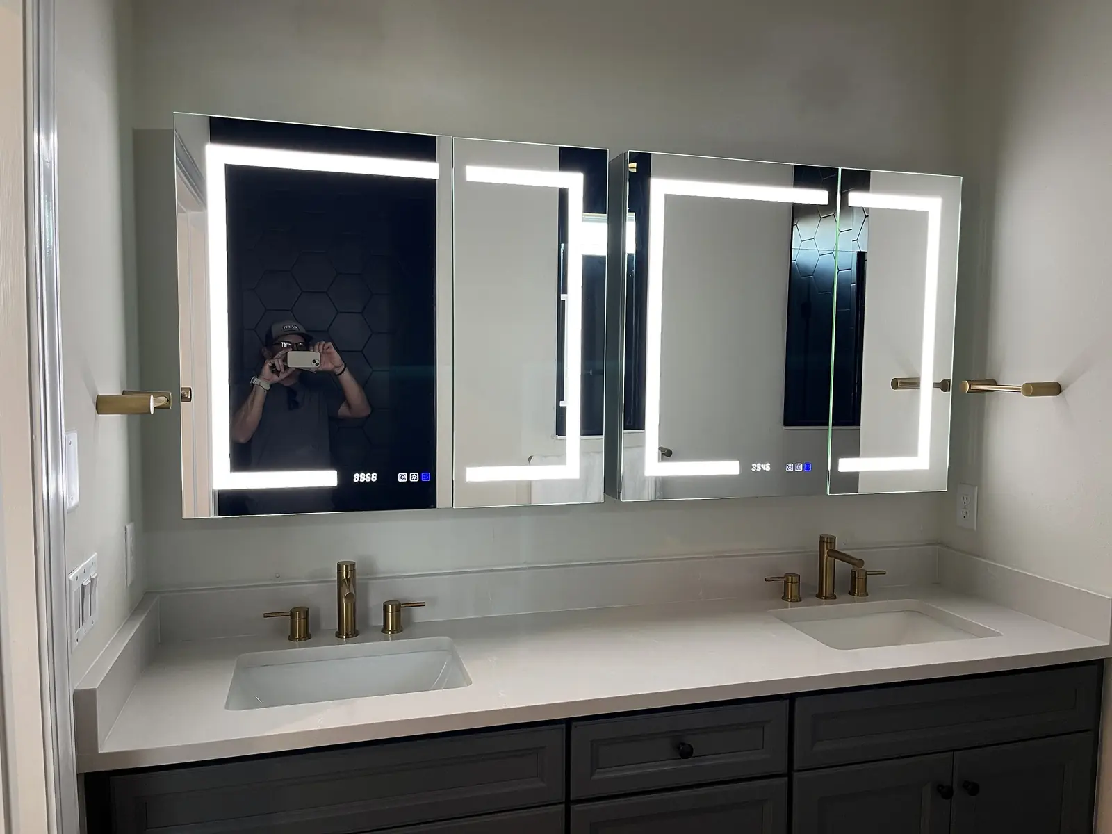 Coordinated LED mirror placement across a double vanity wall