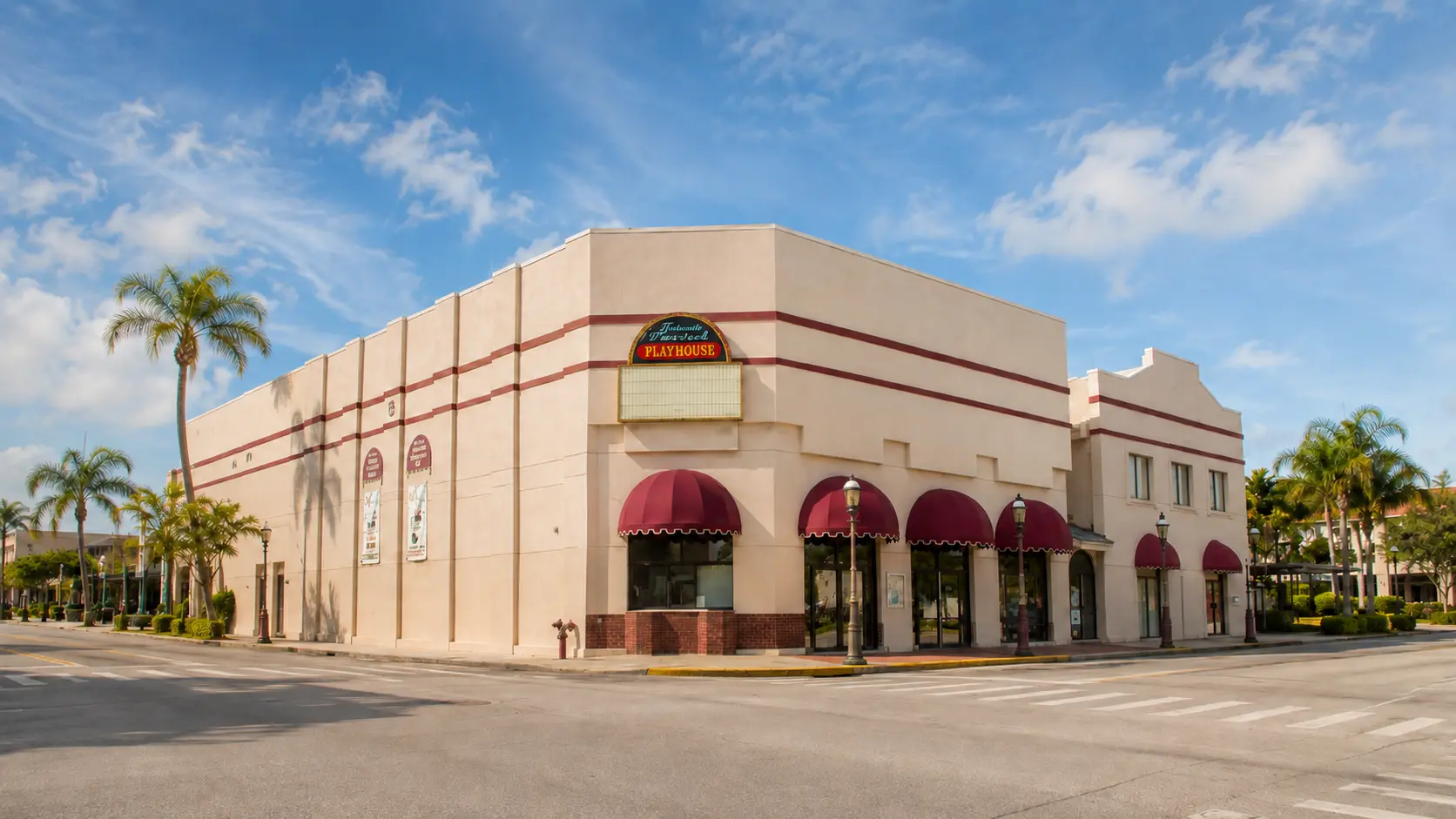 The Titusville Playhouse at its downtown corner beneath a bright Florida sky