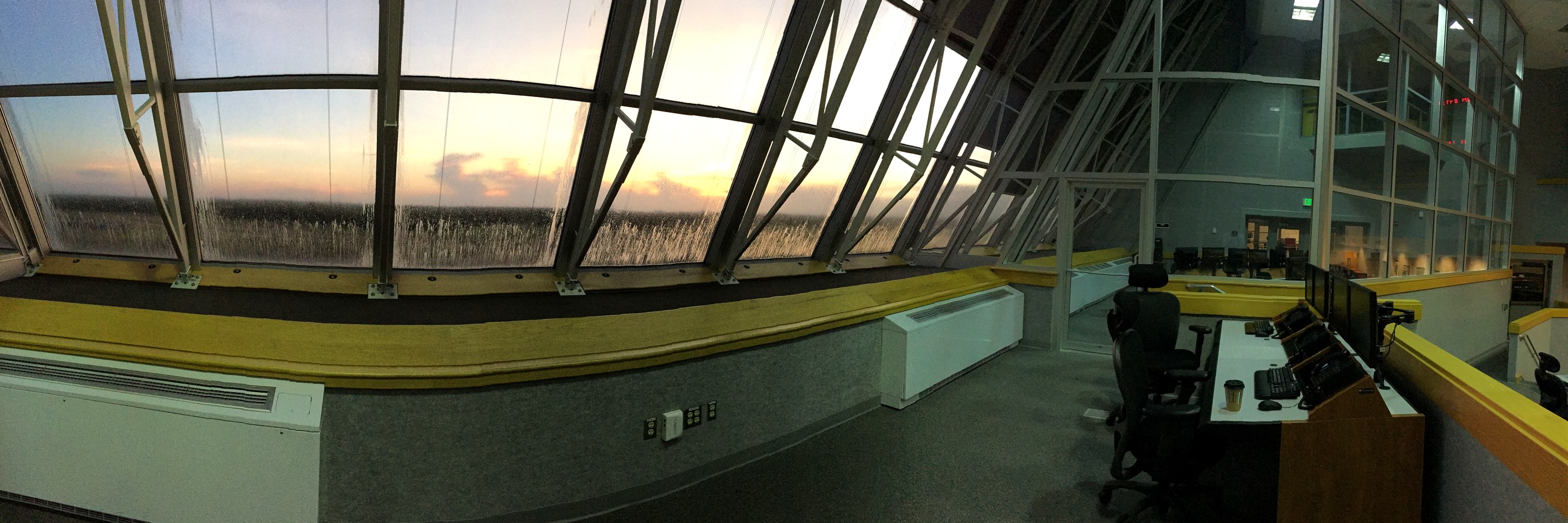 Panoramic sunrise view from Firing Room 1 inside Kennedy Space Center's Launch Control Center
