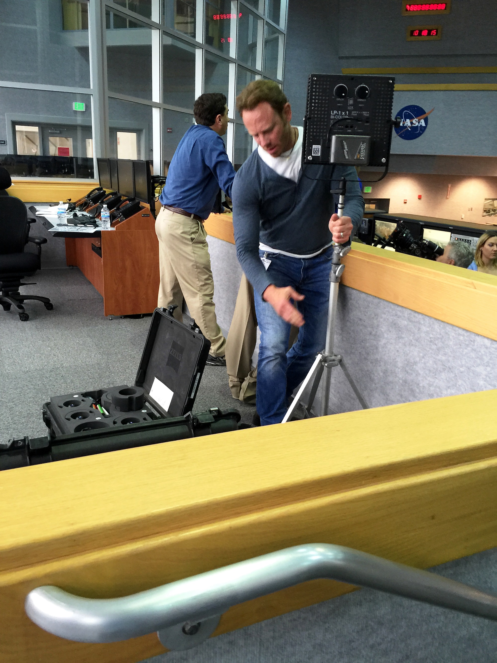 Ian Ziering setting up production equipment inside Firing Room One